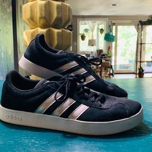 AdidasPGD 789006 Avery superstar black sneaker with silver accents.